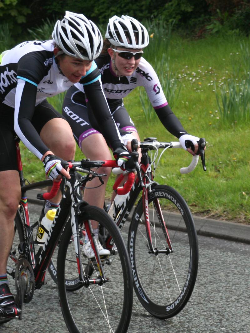 2 athletes cycling during a race