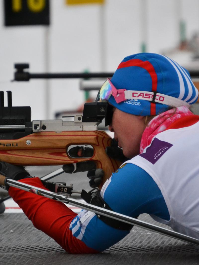 A picture of a woman shooting.