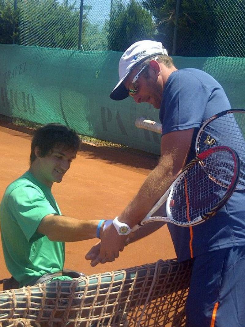 Gustavo Fernandez works with coaches at a ITF workshop in Turkey