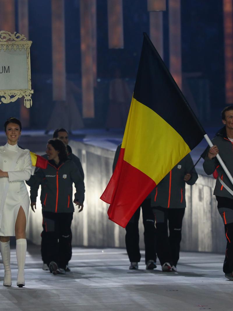 Belgium enter the arena lead by flag bearer Denis Colle during the Opening Ceremony of the Sochi 2014 Paralympic Winter Games