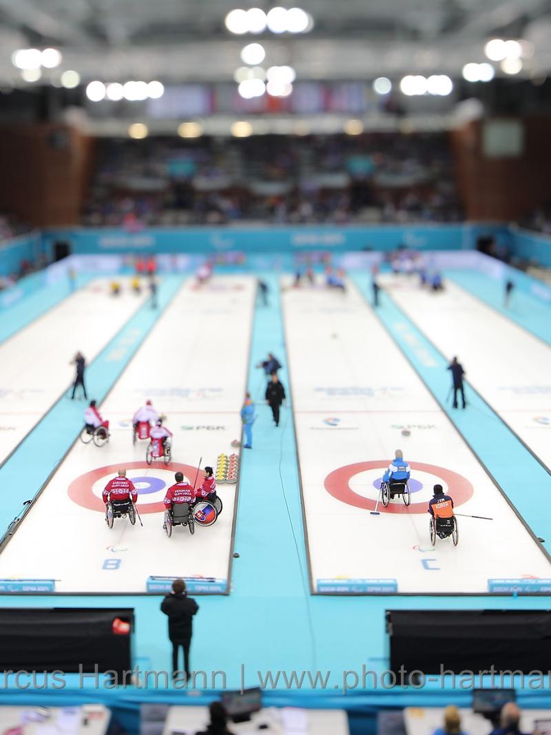 Athletes compete in the Sochi 2014 Paralympic Winter Games wheelchair curling competition.