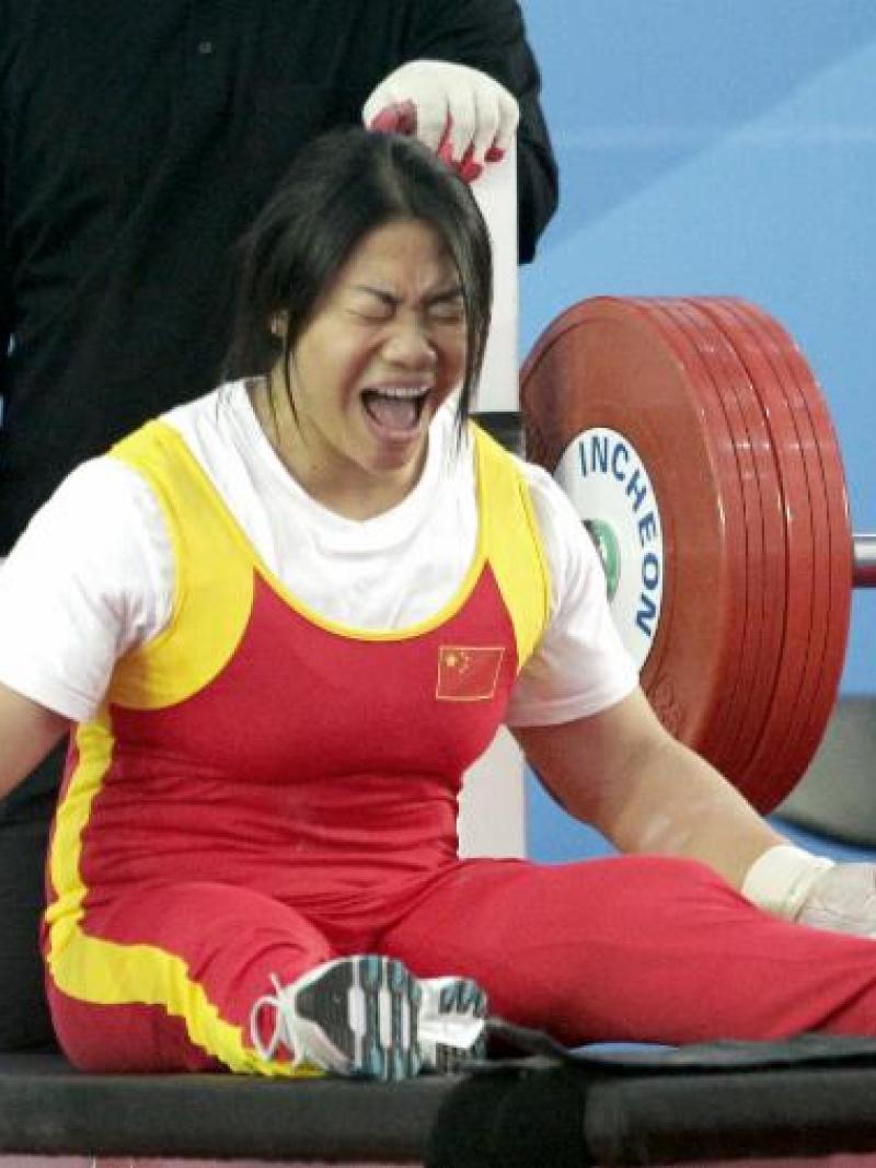 Women on bench screaming of joy