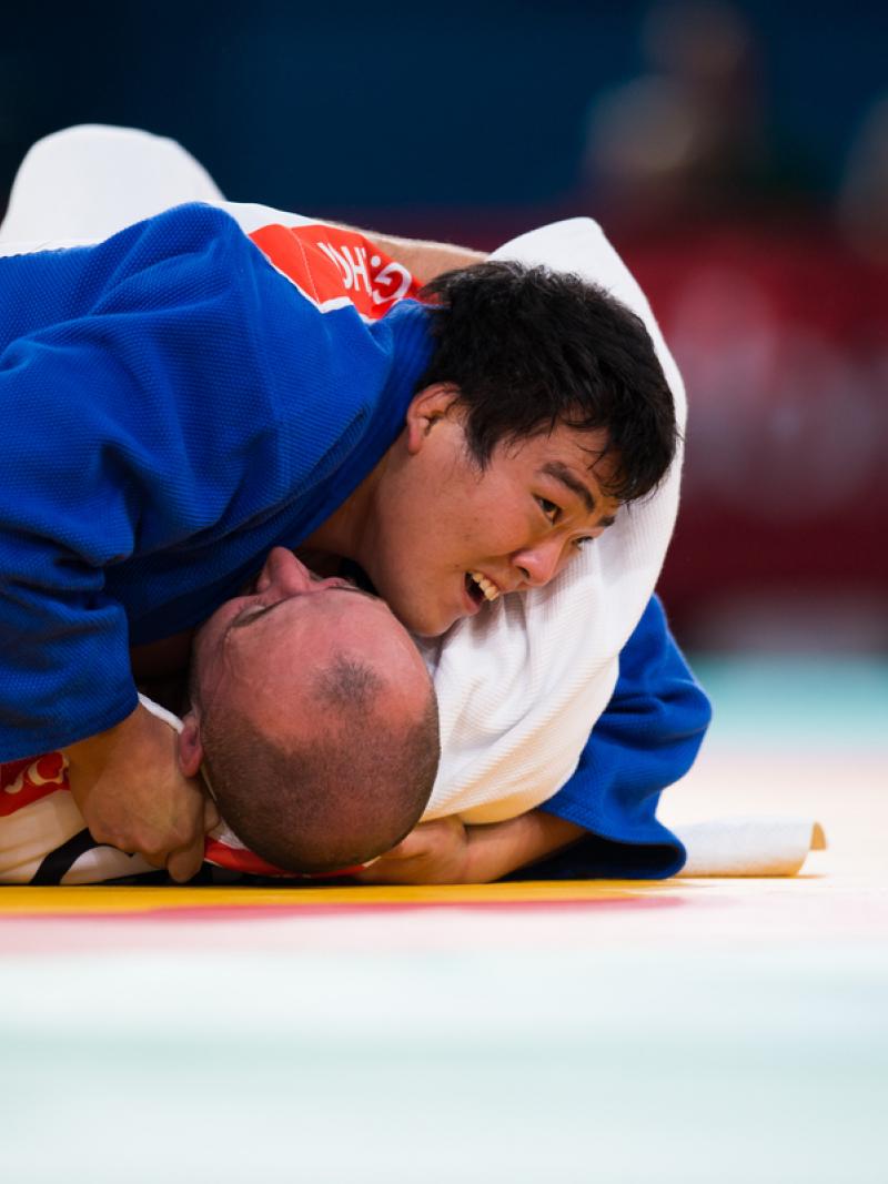 Gwang-Geun Choi of South Korea attacks during the u100kgs quarter-finals at the London 2012 Paralympic Games.