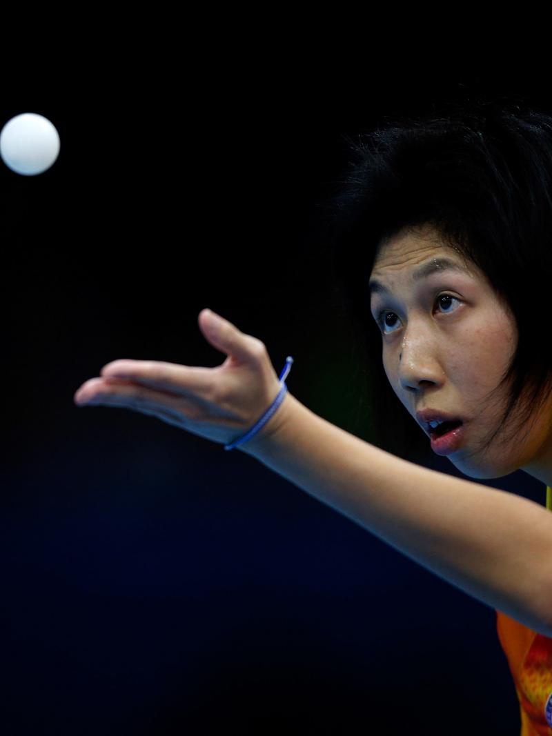 Ka Man Wong of Hong Kong serves during her Women's singles Gold medal match against Chi Ka Yeung of Hong Kong at the London 2012 Paralympic Games.