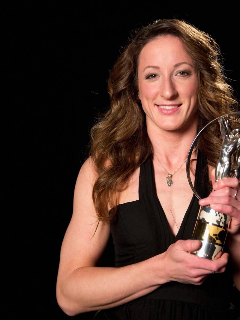 Laureus World Sportsperson of the Year 2015 with a disability winner and Wheelchair Racer Tatyana McFadden of USA poses with her award at Newman Hall on March 28, 2015 in Champaign, llinois, USA.
