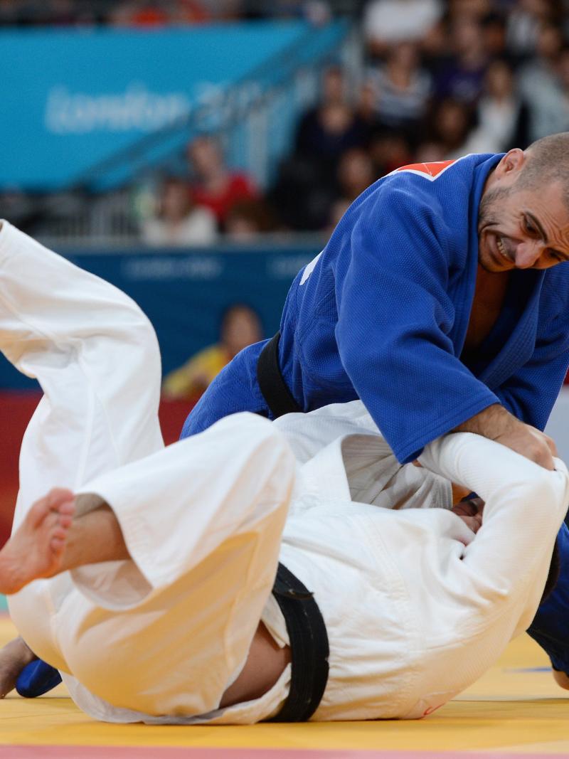 Two men practising judo