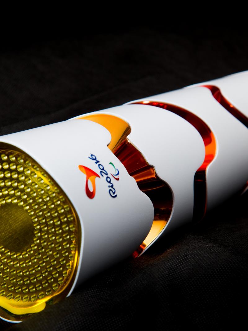 Rio 2016 Paralympic Torch design is white with red, orange circles.