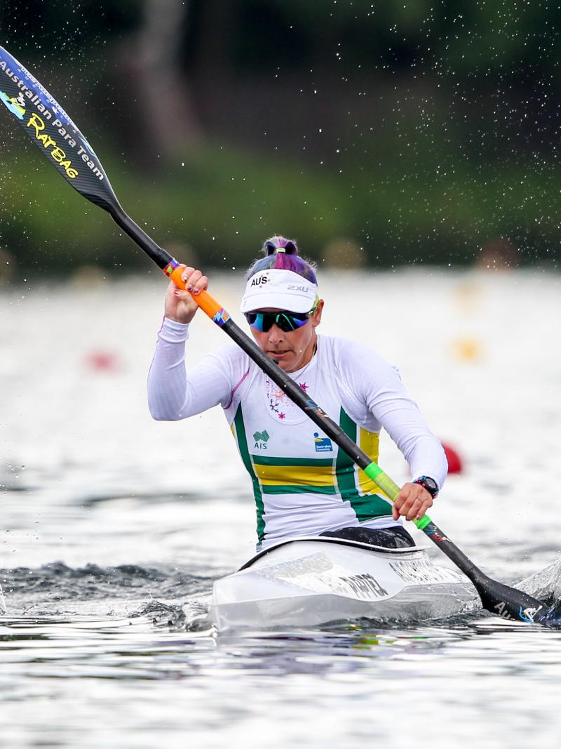Woman paddles in kayak