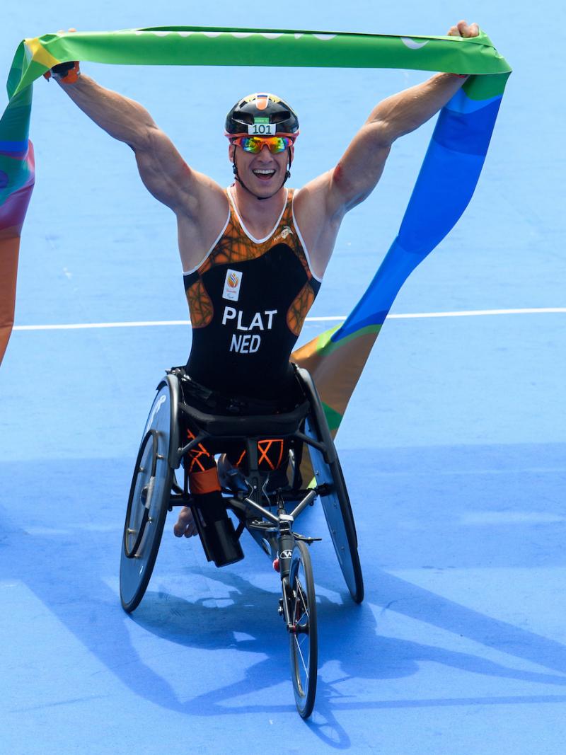 Jetze Plat NED celebrates winning the Gold Medal in the Men's PT1 Triathlon at Fort Copacabana. The Paralympic Games, Rio de Janeiro