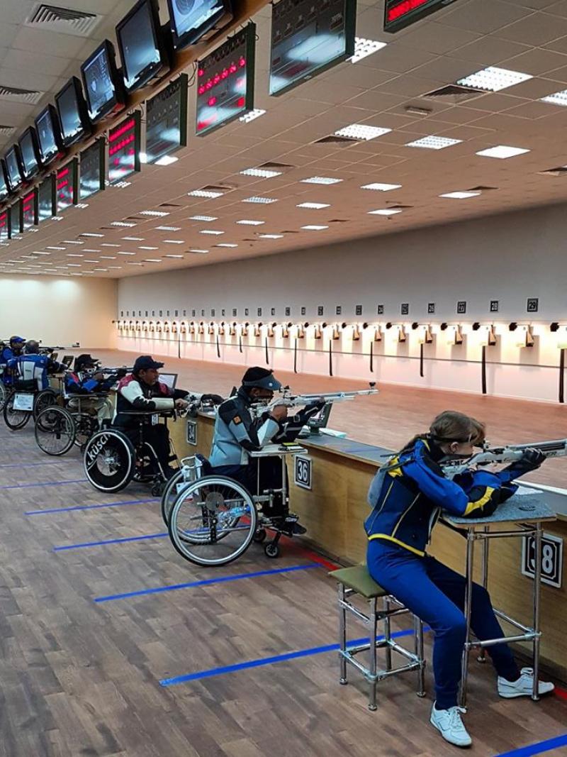 A series of Para sport shooters take aim on the shooting range