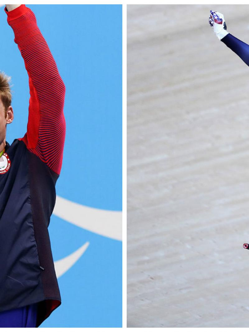 one man stands with arms raised on a podium and one woman waves on a bike