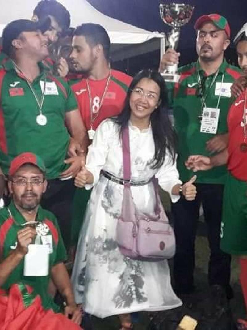 a group of blind footballers celebrate their win