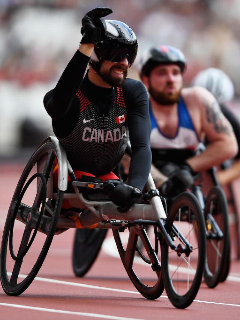 Brent Lakatos of Canada crosses the line to win in the Mens 100m T53 final at the London 2017 Para Athletics Championships.