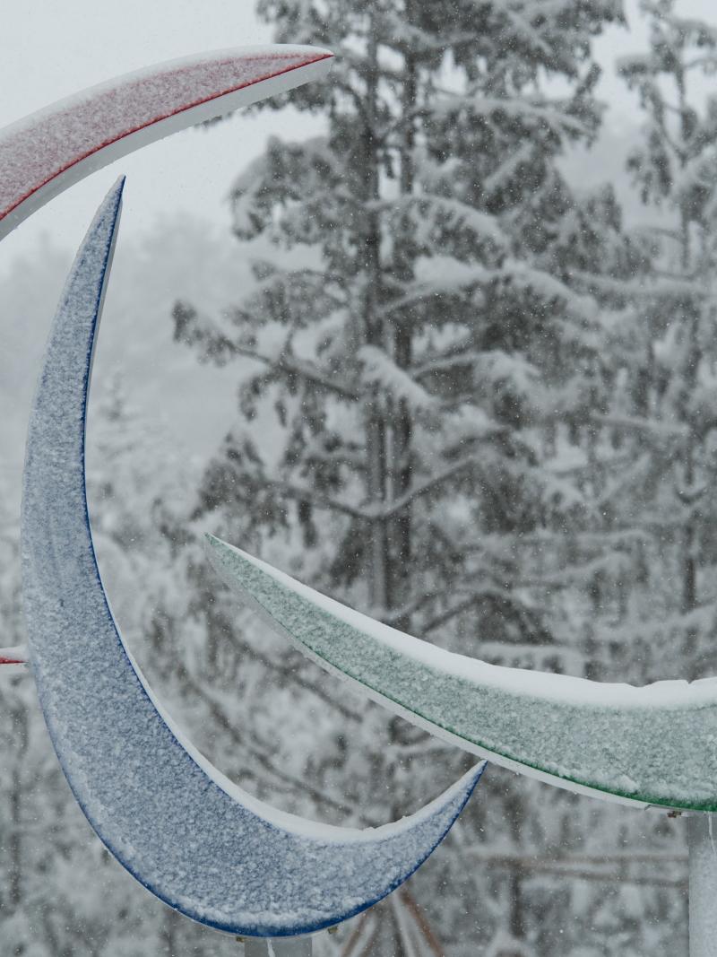 the Agitos symbol covered in snow at the PyeongChang 2018 Paralympic Village