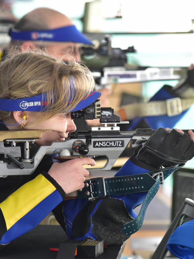 Female shooter in prone position