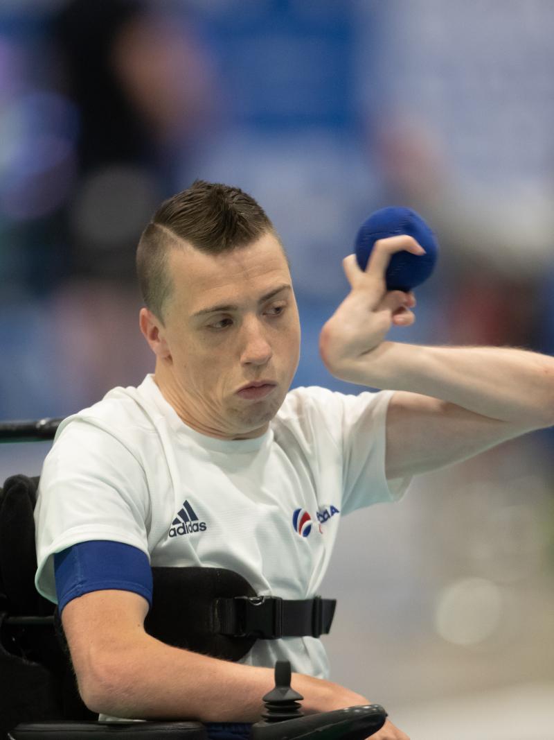 male boccia player David Smith plays a shot