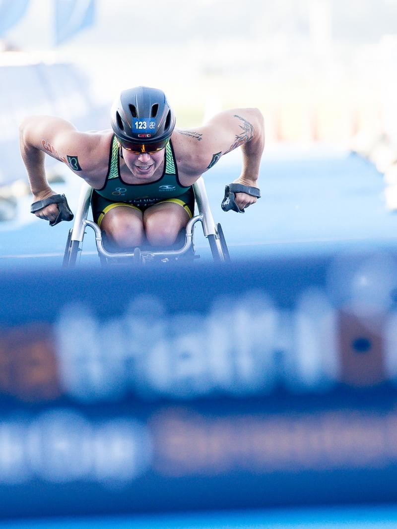 Woman in a racing wheelchair