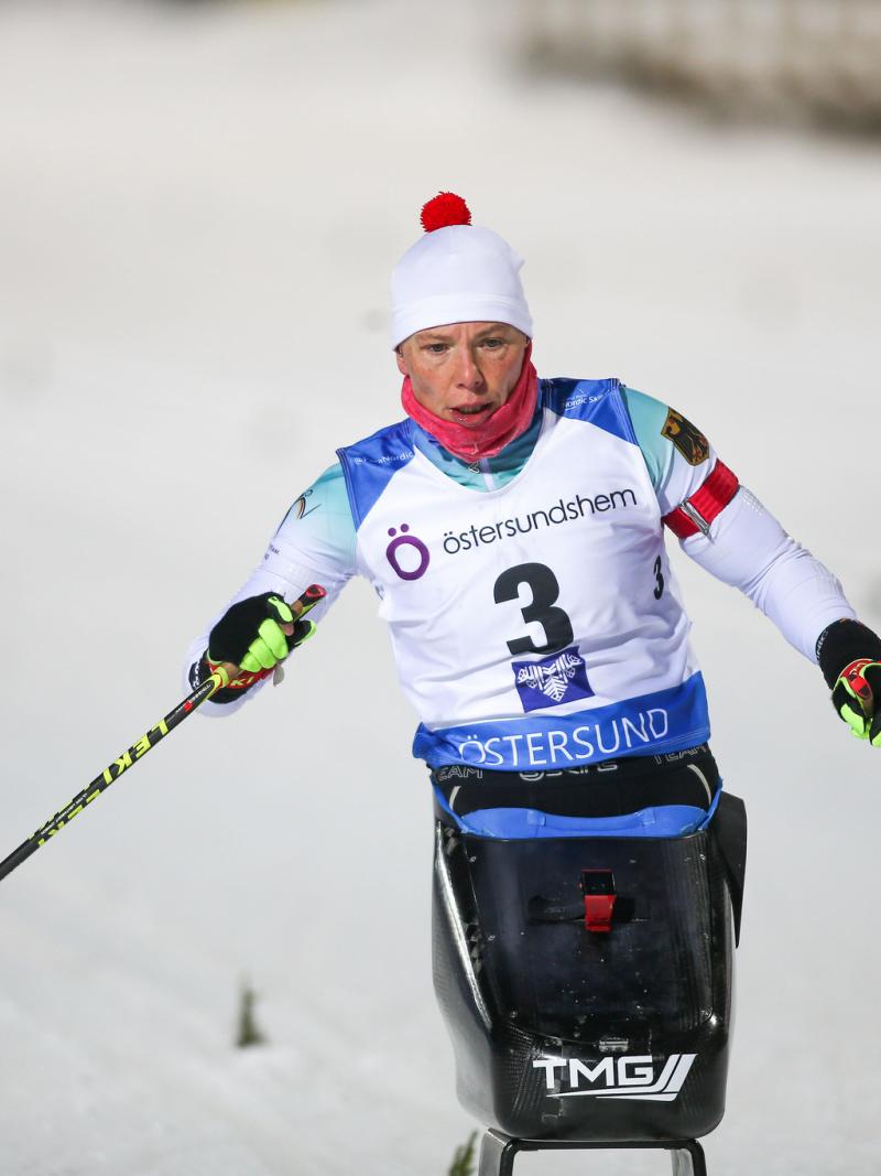 female Para Nordic skier Andrea Eskau steers on the ski course