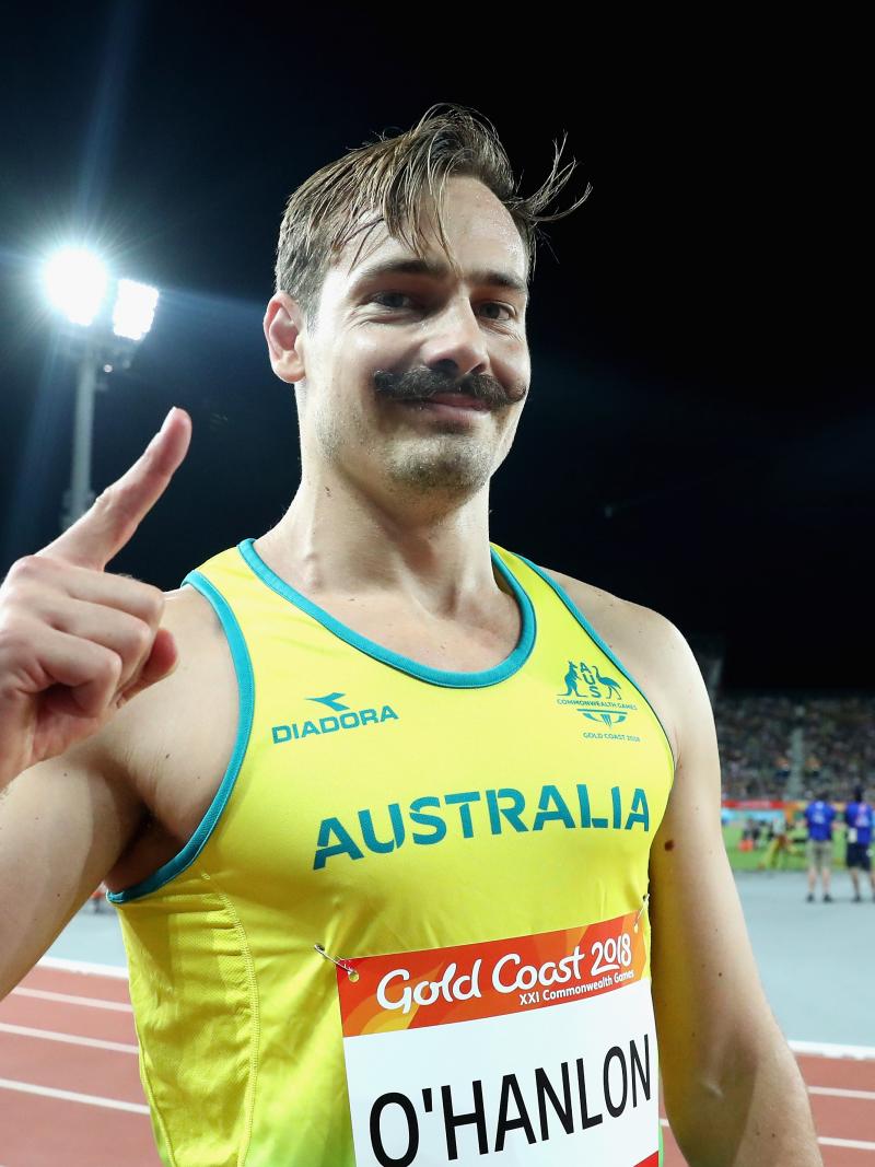 male Para sprinter Evan O'Hanlon gives a thumbs up to the camera