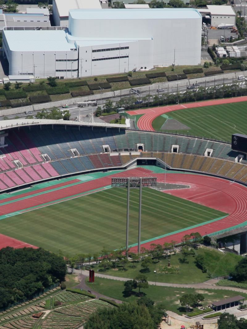 An aerial view of a stadium with an athletics track