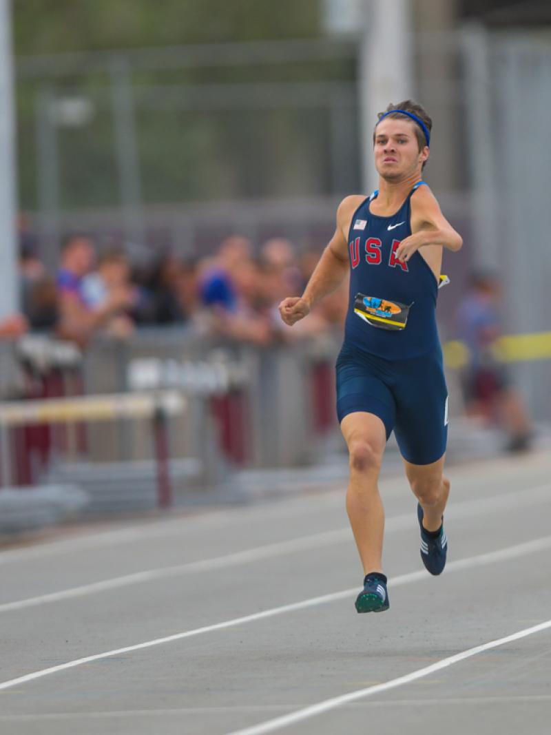 US sprinter on the track running towards the finish line