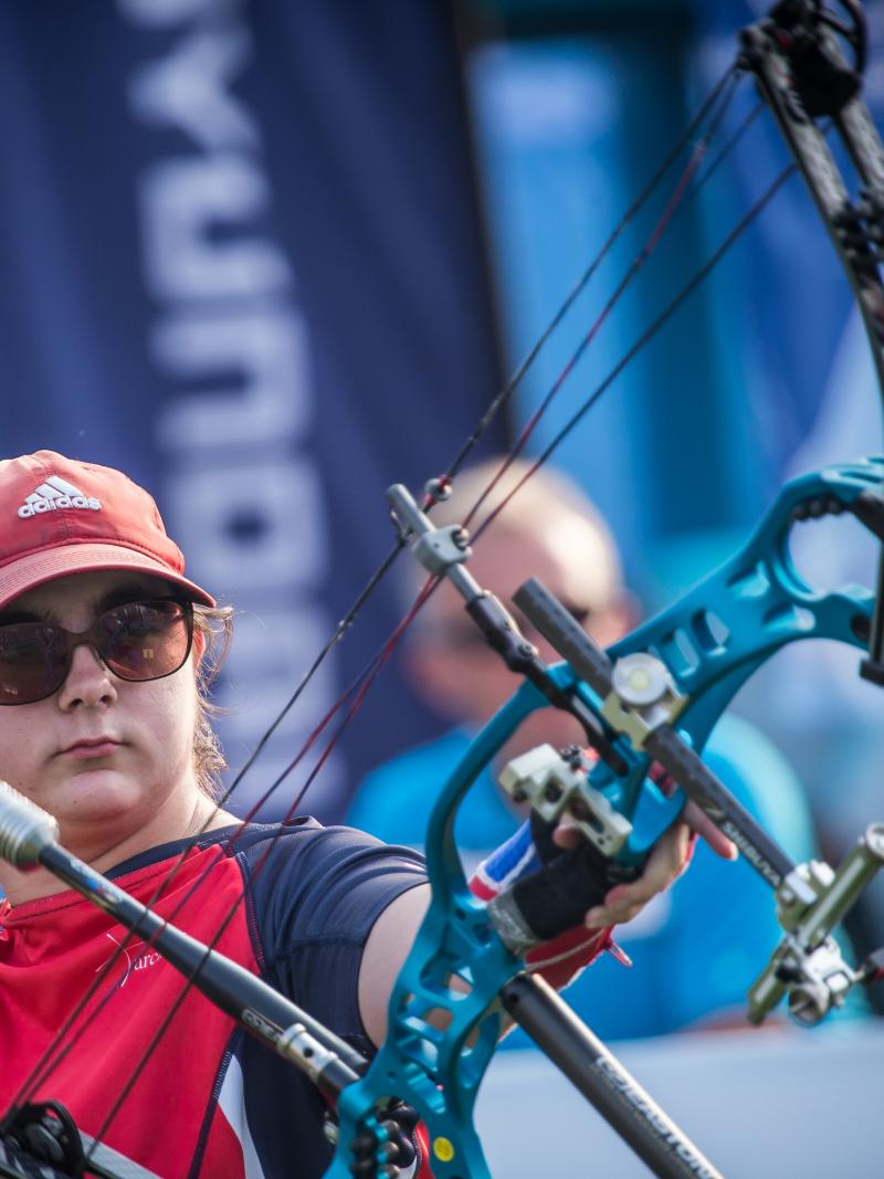 Jessica Stretton wearing glasses and a cap while competing