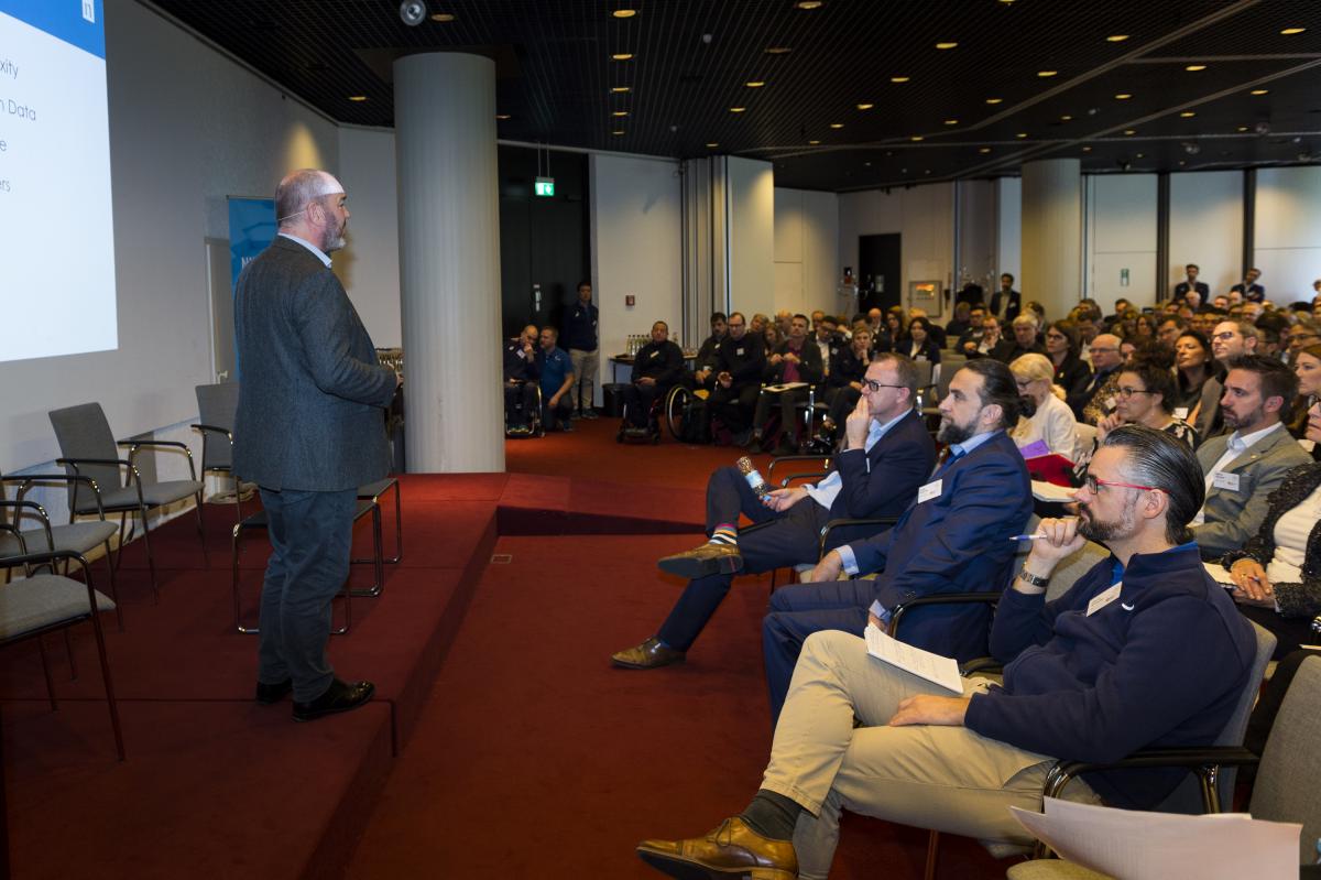 Presenter talking to an audience