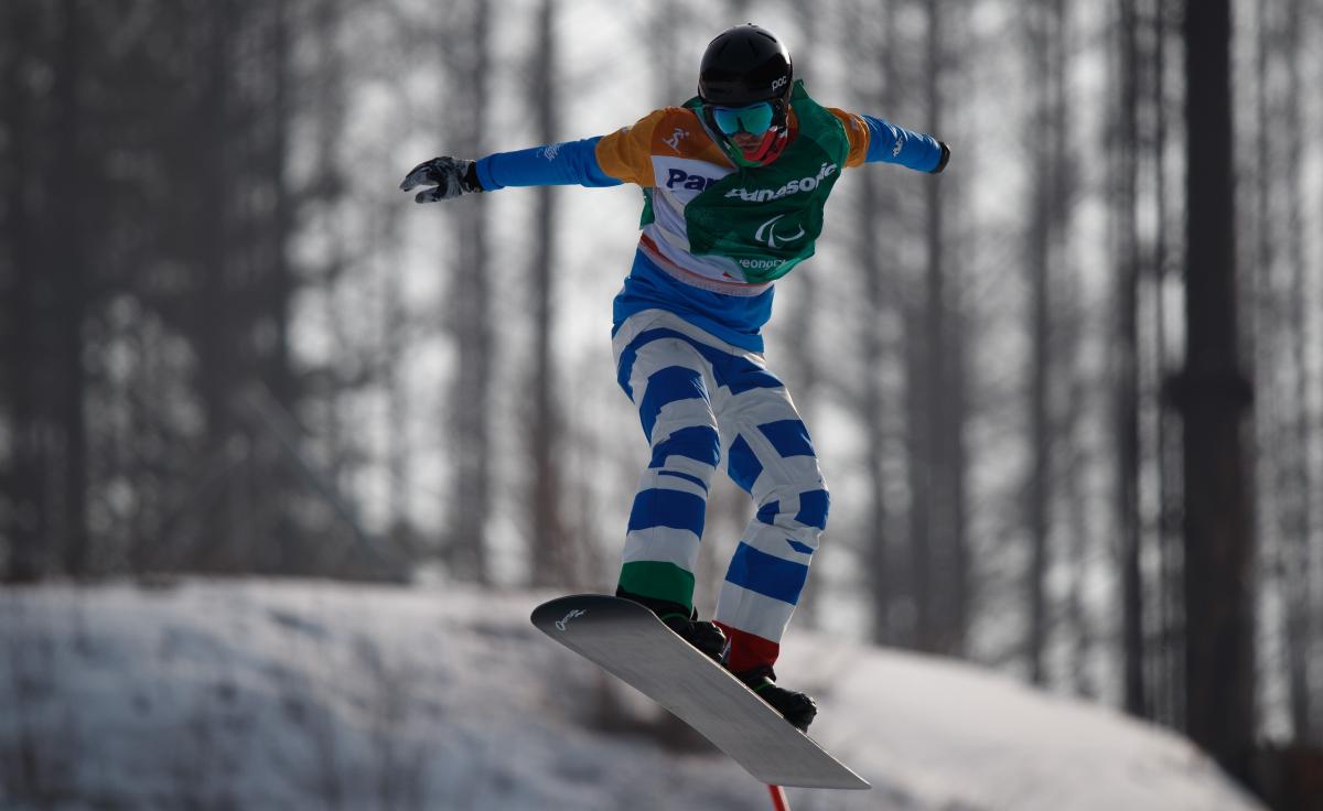 A man snowboarding