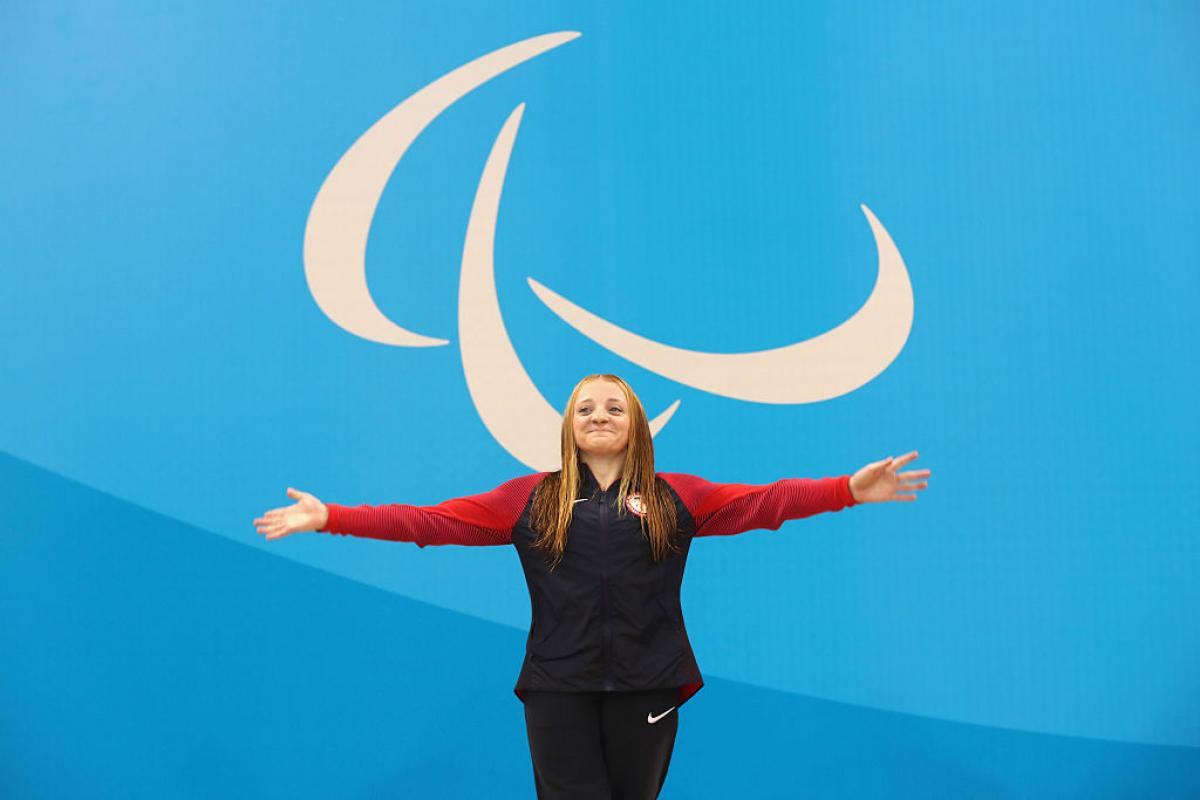 USA's McKenzie Coan celebrates on the podium at the medal ceremony for the women's 100m Freestyle - S7 at Rio 2016 Paralympic Games.