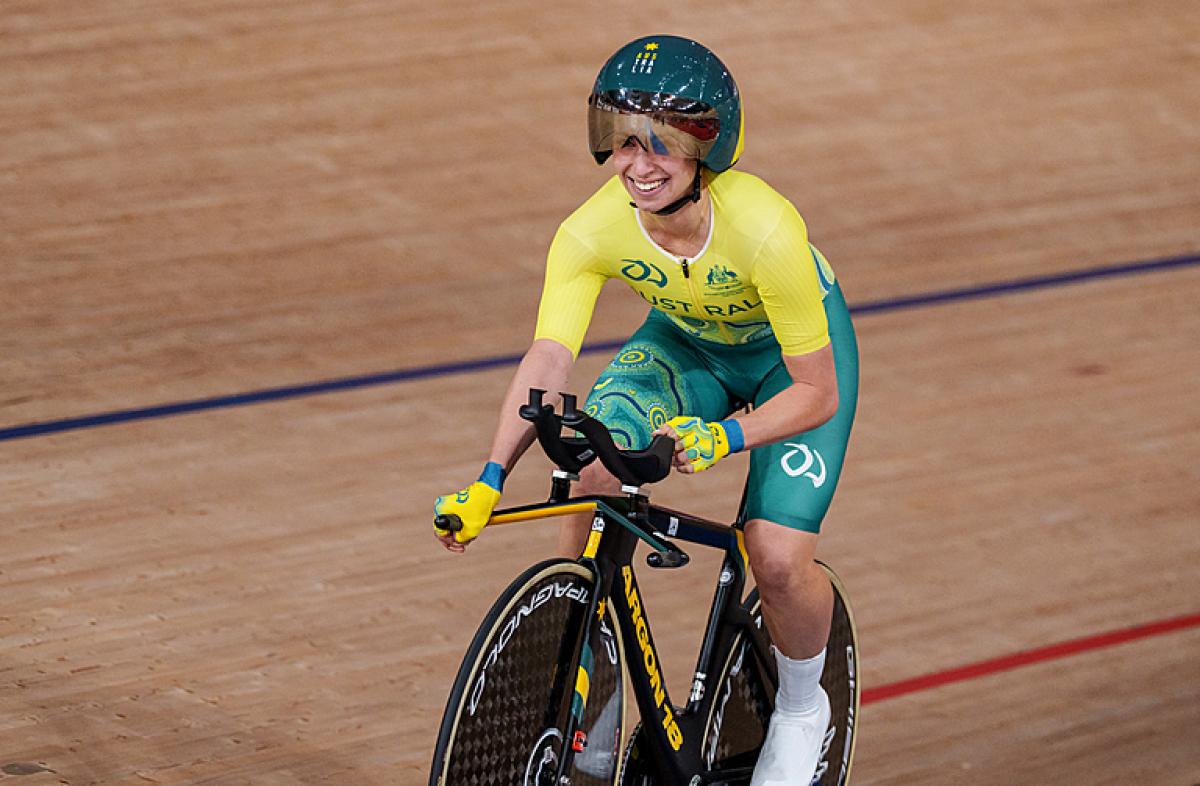 Paige Greco of Australia celebrates as she wins the gold medal