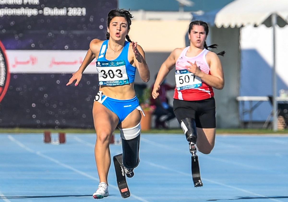 Italy’s Ambra Sabatini (L) en route to gold at Dubai 2021 Grand Prix.