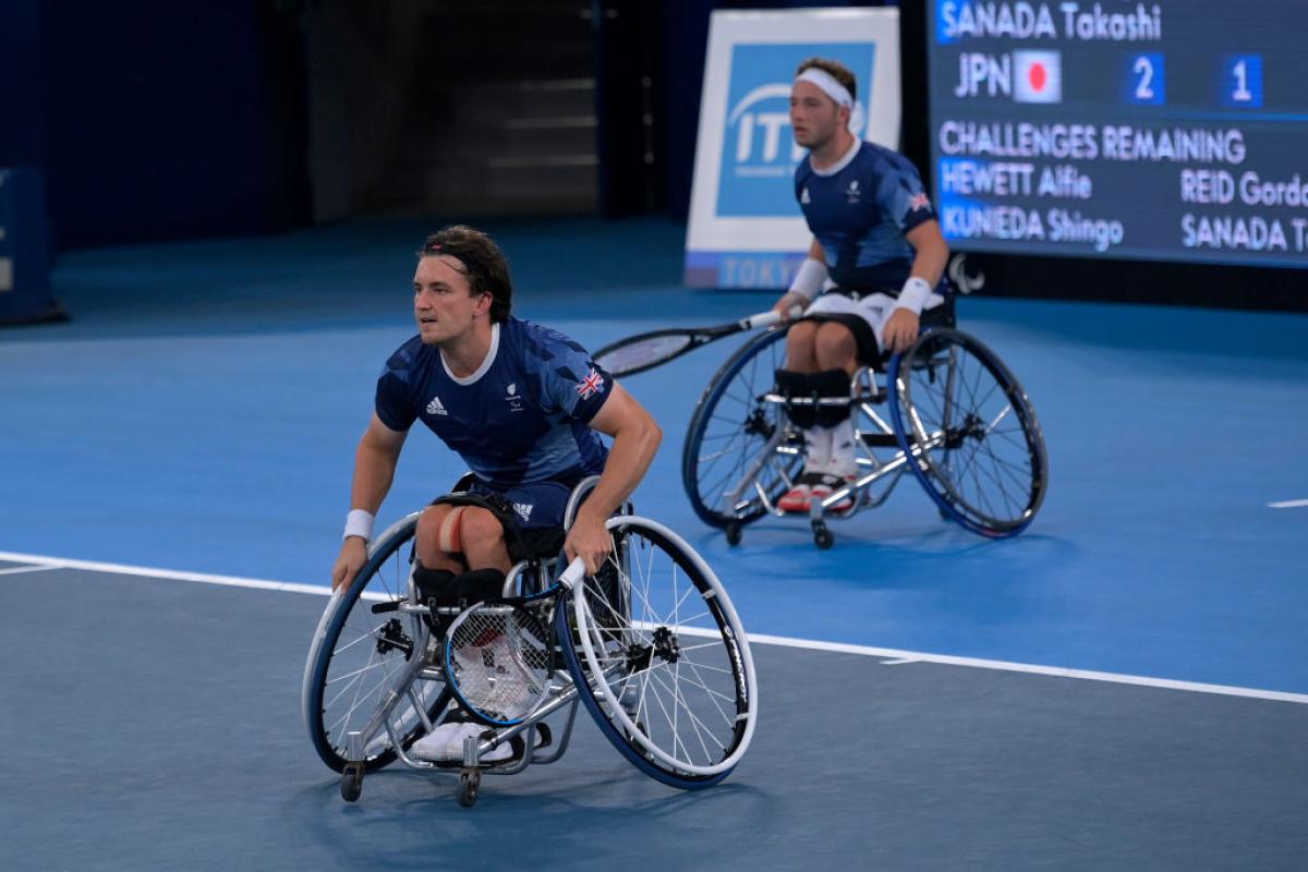 Gordon Reid in action with Alfie Hewett just behind him