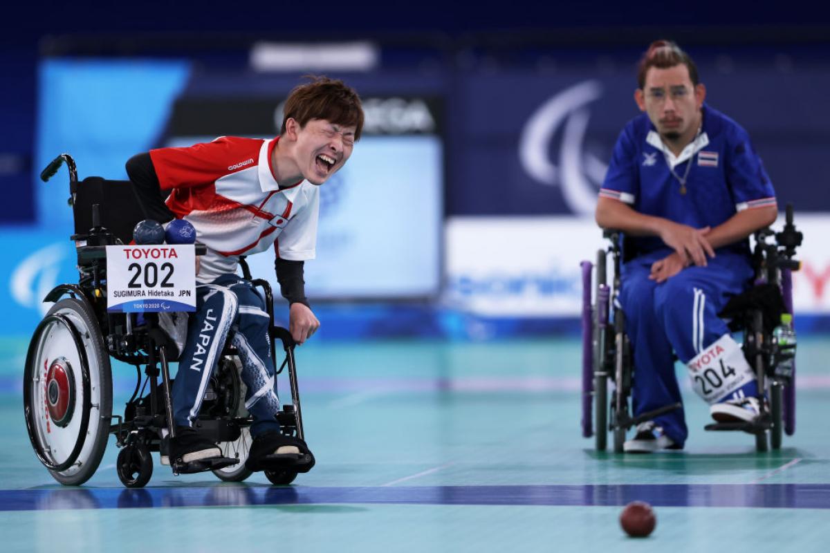 Hidetaka Sugimura of Japan shouts as he competes against Watcharaphon Vongsa in boccia