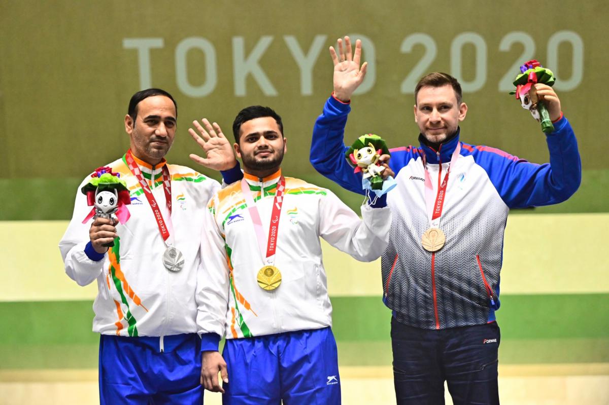 Indian shooters Manish Narwal and Singhraj Adana share the podium