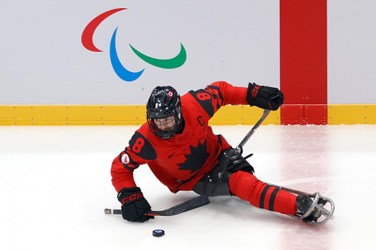  Tyler McGregor of Team Canada controls the puck 