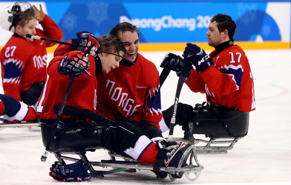 A group of Norwegian Para ice hockey players on ice