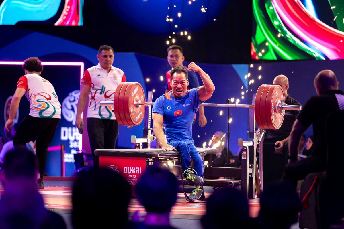 A powerlifter celebrates his win 