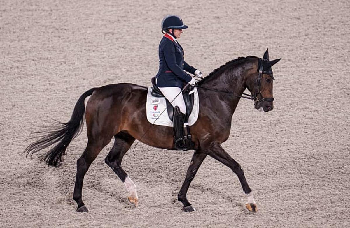 Para equestrian rider Natasha Baker riding a dressage horse