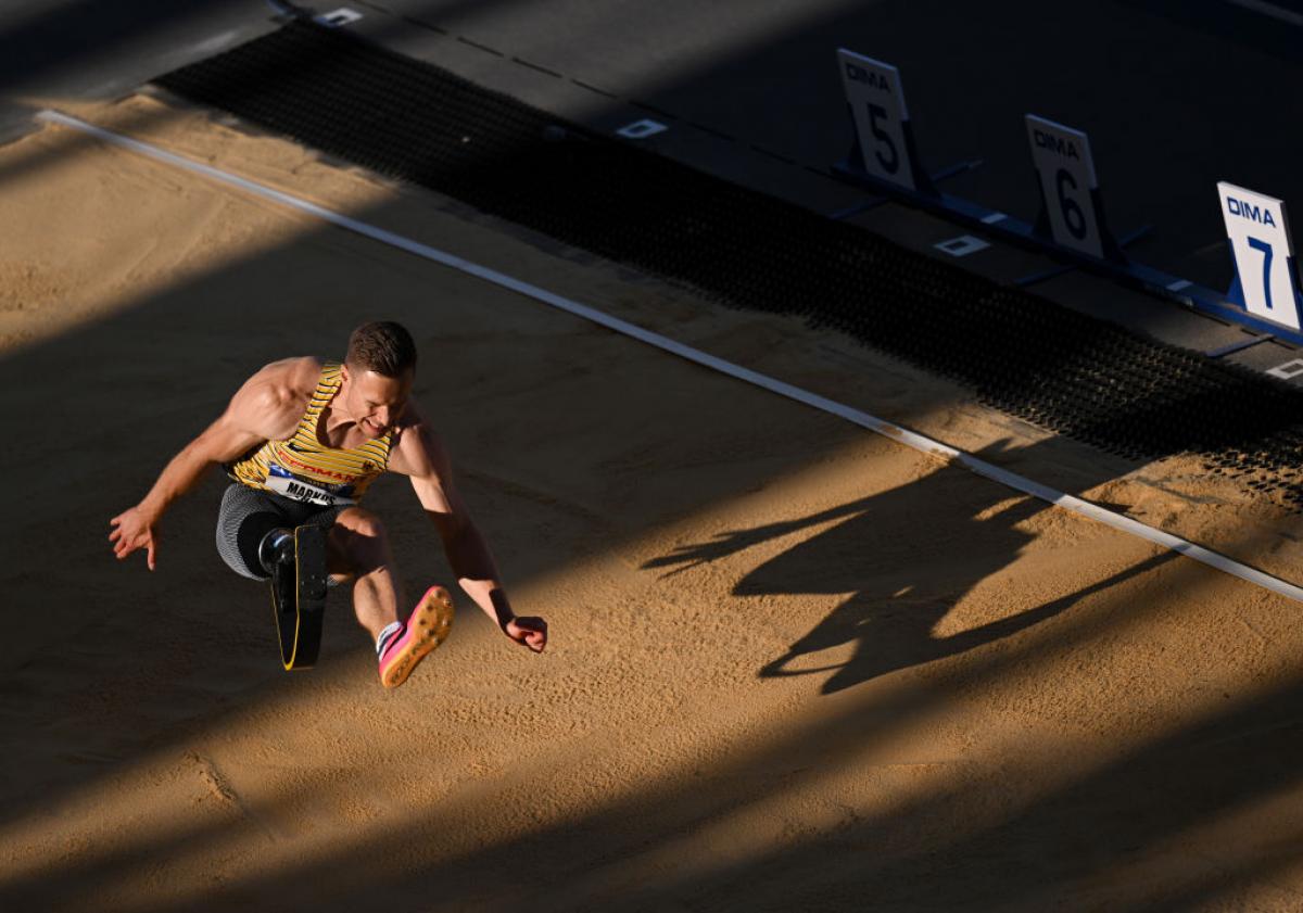 A male long jumper with a prosthetic right leg
