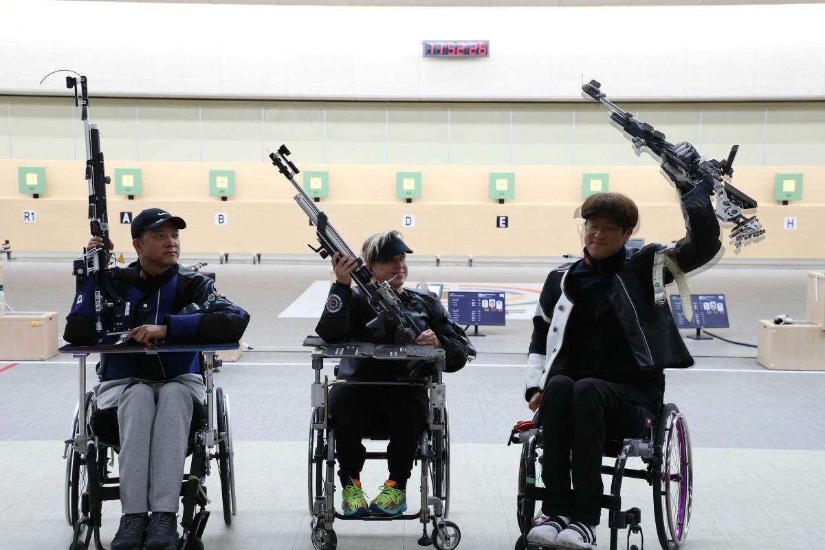 Shooters celebrate after their event