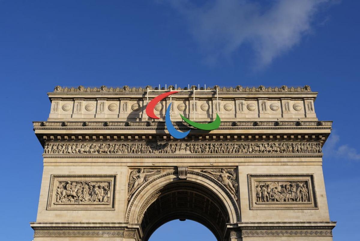 The Paralympic symbol, known as the Agitos, installed on top of the French monument Arc de Triomphe in Paris