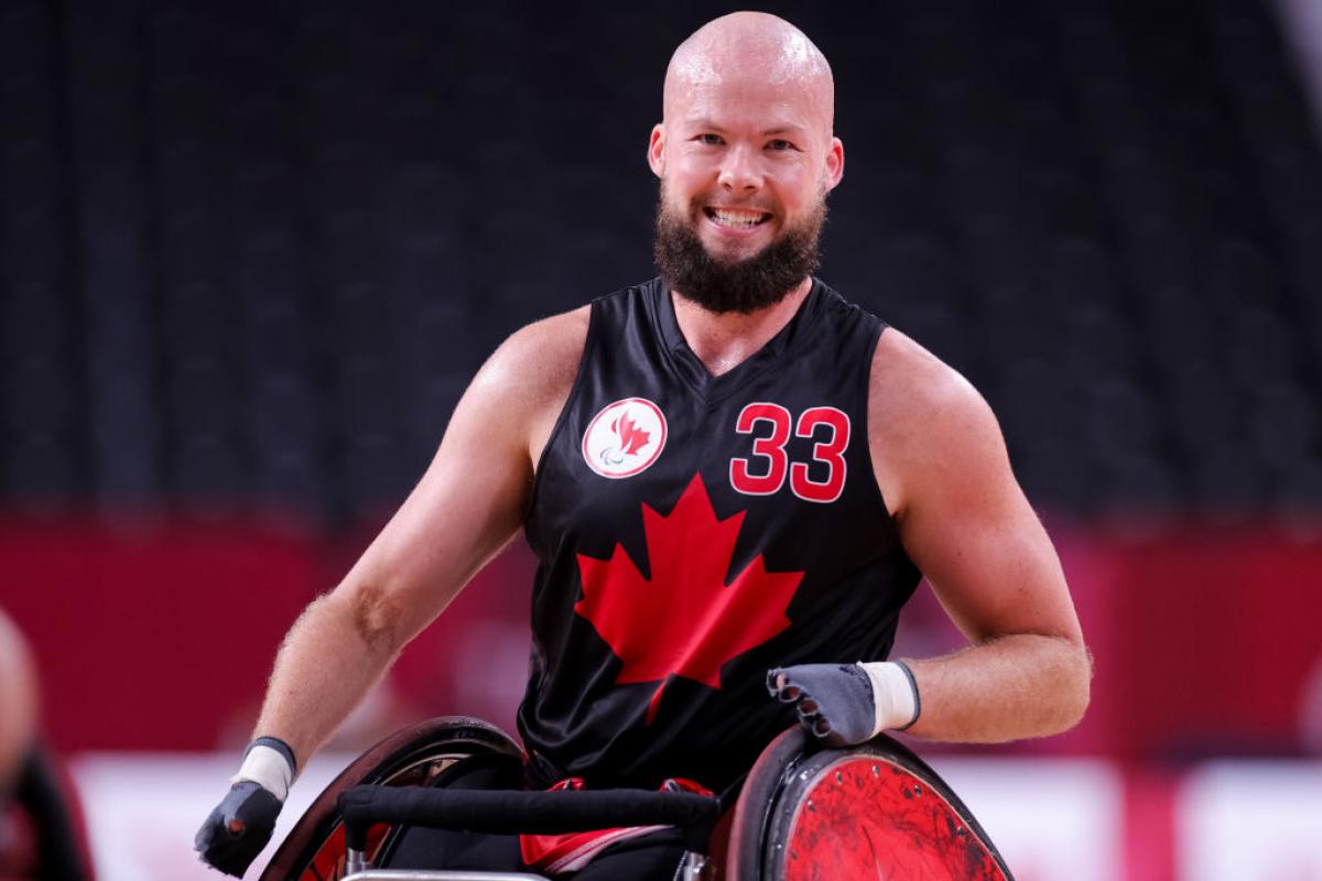 A male wheelchair rugby player in action during the Tokyo 2020 Paralympics.