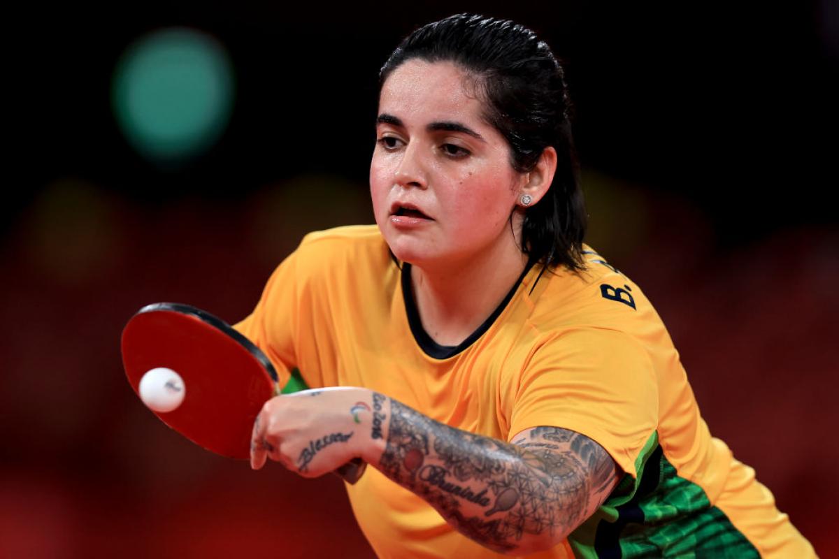 A female Para table tennis player in action