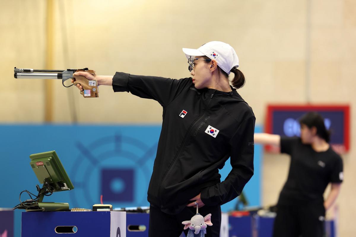 A female shooter in a pistol event