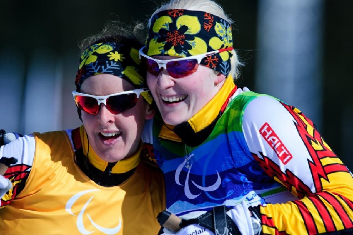 Courtney Knight posing with her guide Andrea Bundon at the 2012 Vancouver Paralympic Winter Games