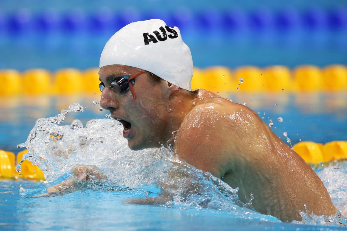 A picture of a man swimming.