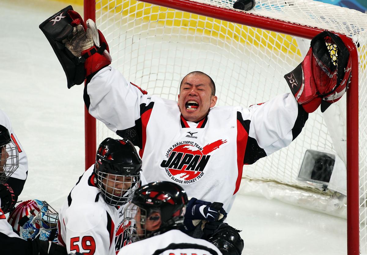 A picture of a man celebrating his victory