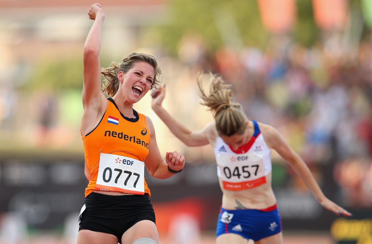 Marlou van Rhijn  crosses the finish line to win gold in the women's 100m T44, one of the highlights of the 2013 IPC Athletics World Championships in Lyon, France.