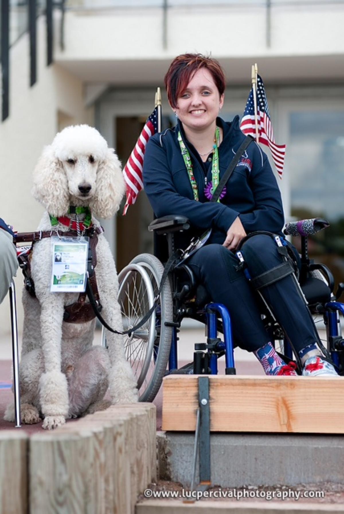 US para-equestrian rider Sydney Collier with service dog Journey.