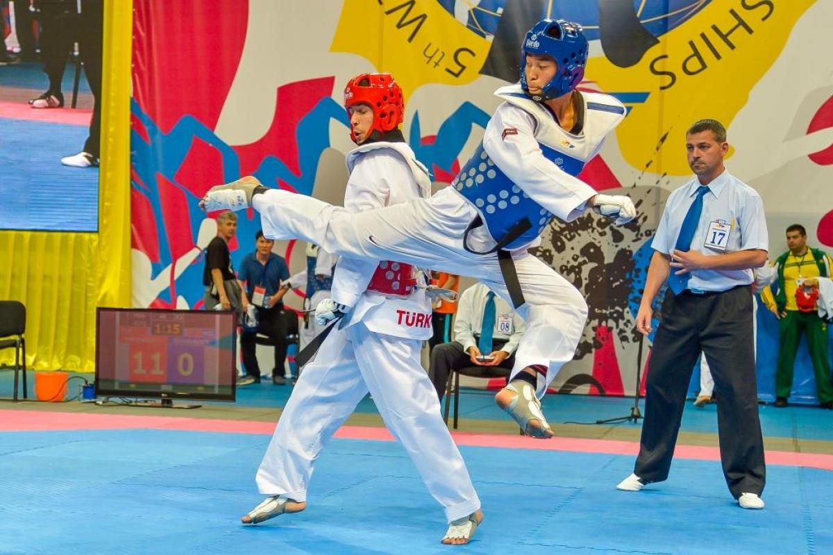 Two athletes doing taekwondo